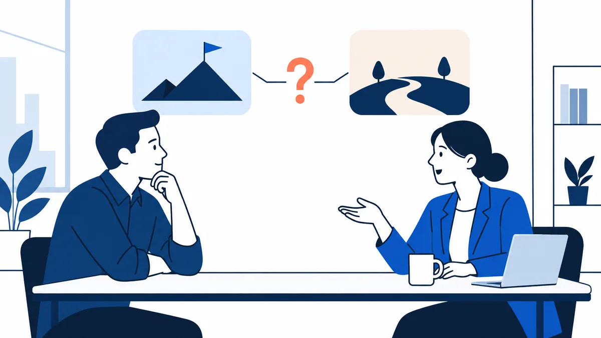 Two coworkers sit at a desk with a question mark between two landscape diagrams.